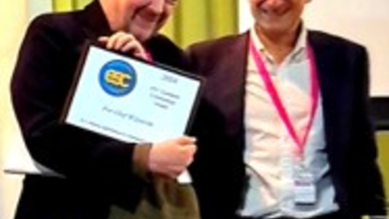 Professor Wikström receiving his award from the ESC President